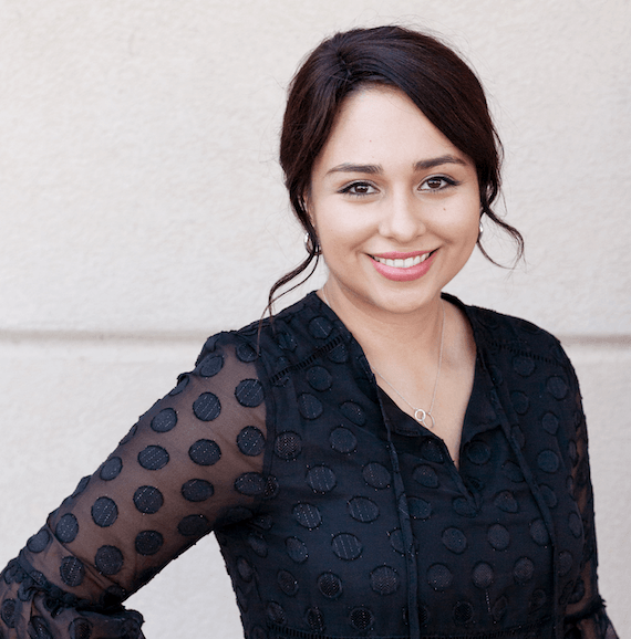 A headshot of Andrea Sisneros.